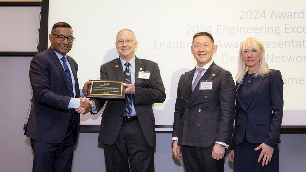 Awardee receives his award
